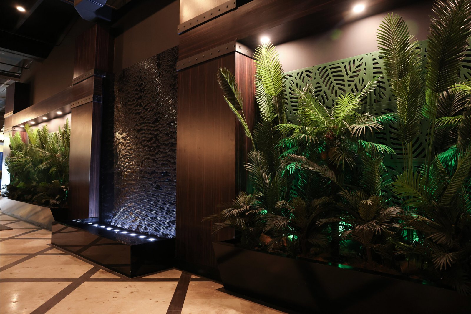 Black scored water wall with reflection pool at amped fitness in west palm beach florida 1